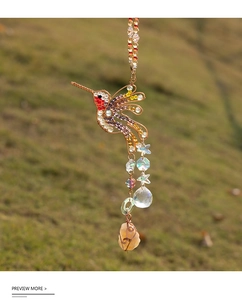 Detailed hummingbird crystal suncatcher with colorful beads and wire-wrapped gemstone