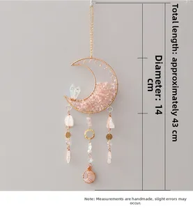 Detail view of pink crystal moon suncatcher with dimensions 43cm length and 14cm diameter