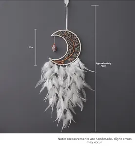Detail of moon-shaped dream catcher with white feathers and life tree stone 20x70cm