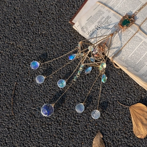 Bohemian gold geometric suncatcher with green agate and rainbow crystal prisms