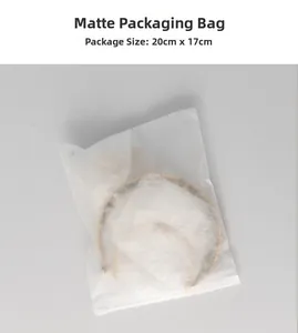 Detailed view of matte packaging bag measuring 20cm x 17cm for tree of life suncatchers