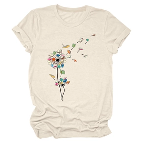 Close-up of the creative dandelion book print on this beige round neck cotton t-shirt
