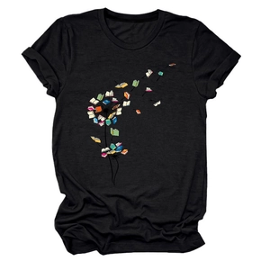 Close-up of dandelion art print made of flying books on black cotton T-shirt
