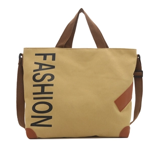 Large khaki canvas tote bag with brown straps and vertical FASHION print for women