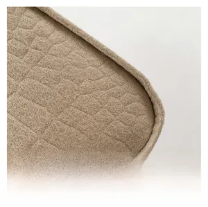 Close-up of khaki faux crocodile texture and premium stitching on a stylish crossbody bag