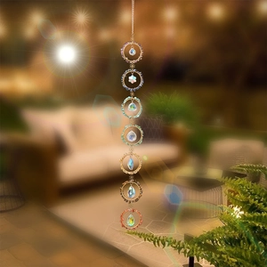 Bohemian 7-chakra crystal suncatcher with natural crushed stones and hanging prisms
