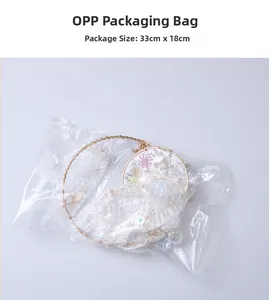 Detail of crystal suncatcher in OPP packaging, dimensions 33cm by 18cm displayed clearly
