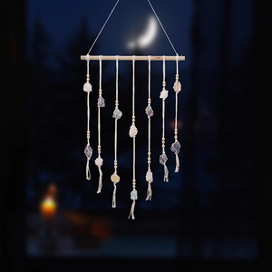 Bohemian wall hanging with natural crystals and wooden beads on cotton rope decor