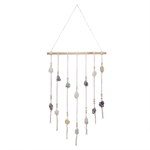 Bohemian wall hanging with natural wooden stick, white cotton ropes and colorful raw stones