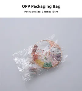 Detail view of the Tree of Life wind chime in OPP packaging, dimensions 33cm x 18cm