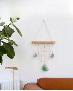 Bohemian wall hanging with natural crystals, green agate slice and woven cotton rope