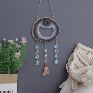 Bohemian agate slice wind chime with colorful crystal beads and a pink stone pendant