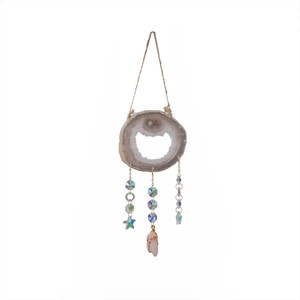 Handmade agate wind chime with brown natural stone slice and crystal point pendant