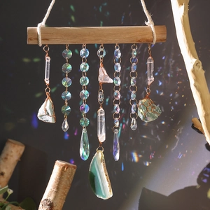 Handmade bohemian crystal suncatcher wall decor with natural stones and wooden bar