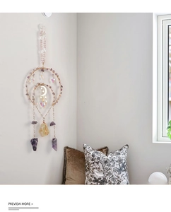 Bohemian style wall hanging featuring natural amethyst stones and golden moon accents
