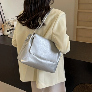 Large silver metallic tote bag with chain strap, stylish shoulder bag for daily commuting