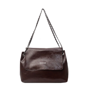 Deep brown glossy leather tote bag with silver chain strap and fashion bags slogan
