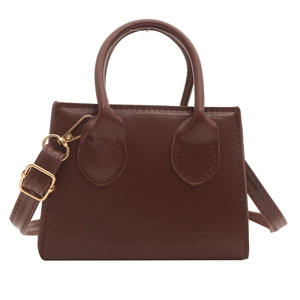 Minimalist brown PU leather crossbody bag with dual handles and gold-tone hardware