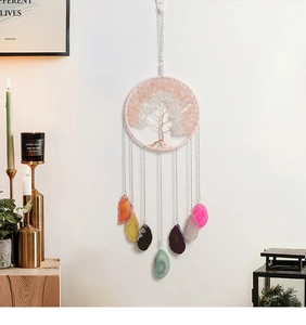 Detail of life tree dream catcher with natural crystal stones and colorful agate slices