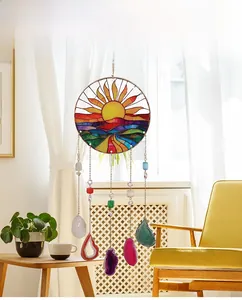 Detail of suncatcher with vibrant hand-painted glass and colorful agate slice pendants