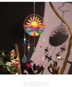Detail of sun catcher featuring stained glass art, crystal beads and natural agate slices