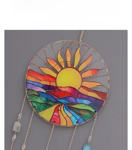 Detail of acrylic suncatcher featuring tree of life and agate stone in Nordic style
