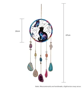 Detail view of cat and butterfly dreamcatcher with natural agate stones and amethyst crystals