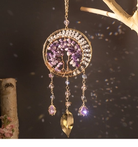 Detailed view of handmade Tree of Life wall hanging with purple amethyst and gold metal frame