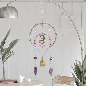 Bohemian amethyst suncatcher with gold metal rings and hanging crystal prisms