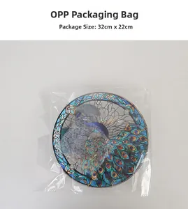 Detail showing peacock suncatcher ornament packed in protective OPP bag and bubble wrap