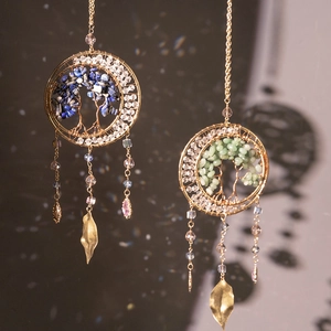 Handmade life of tree suncatcher with natural crystal stones and golden wire leaf pendants