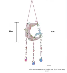 Detail view of pink crystal moon wall hanging decoration with 13cm width and 45cm length