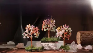 Three handmade crystal trees on agate bases with rose quartz and citrine leaves decor