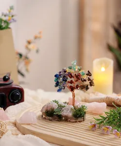 Detailed view of handmade chakra crystal tree with natural gemstone base for home decor