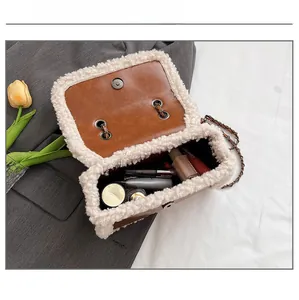 Internal view of crossbody bag with plush trim showing capacity for daily cosmetics