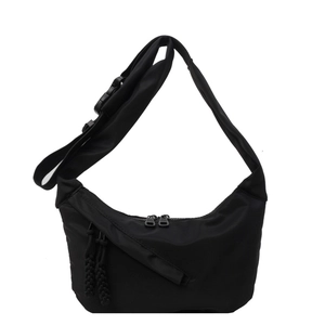 Minimalist black crescent hobo tote bag with wide strap for stylish daily commuting