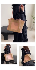 Detail of hand-woven straw tote bag with pink leather trim and textured pattern