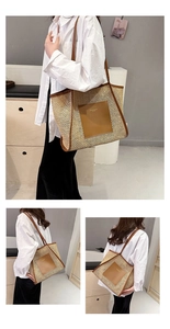 Detail of woven straw tote bag featuring brown leather trim and fashion text logo
