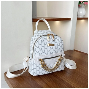 Detail of white mini backpack with gray M-letter print and thick gold metal chain