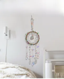 Macro detail of Tree of Life dream catcher with crystal stones and hanging beads