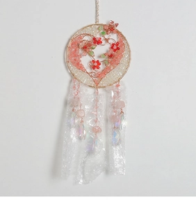 Handmade Tree of Life wall hanging with colorful beads and heart-shaped wire frame