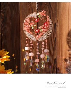 Handmade Tree of Life crystal wall hanging with pink stones and sun-drenched floral decor
