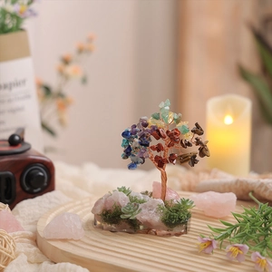 Handmade tree of life crystal decor with colorful gemstones and a rose quartz resin base