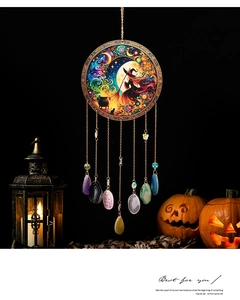 Detailed view of Halloween dream catcher with natural agate stones and wizard moon art