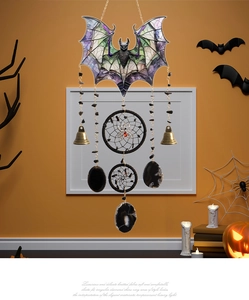 Gothic black acrylic bat pendant with hanging bells and spider gemstone detail for Halloween