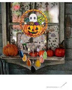 Detail of Halloween pumpkin and ghost wreath with colorful agate stone slices