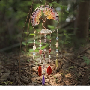 Detailed view of Tree of Life crystal wind chime with colorful natural gemstones and beads
