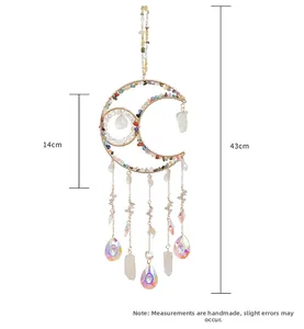 Detail of moon suncatcher with colorful crushed crystals and clear teardrop pendants