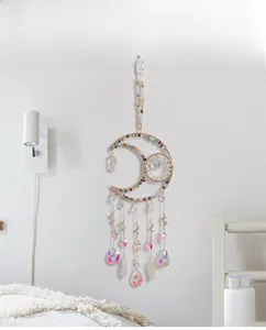 Bohemian moon-shaped suncatcher with colored crystal gravel and raw stone pendants