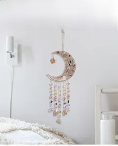 Detail of moon-shaped Tree of Life suncatcher with AB crystal beads and teardrop pendants
